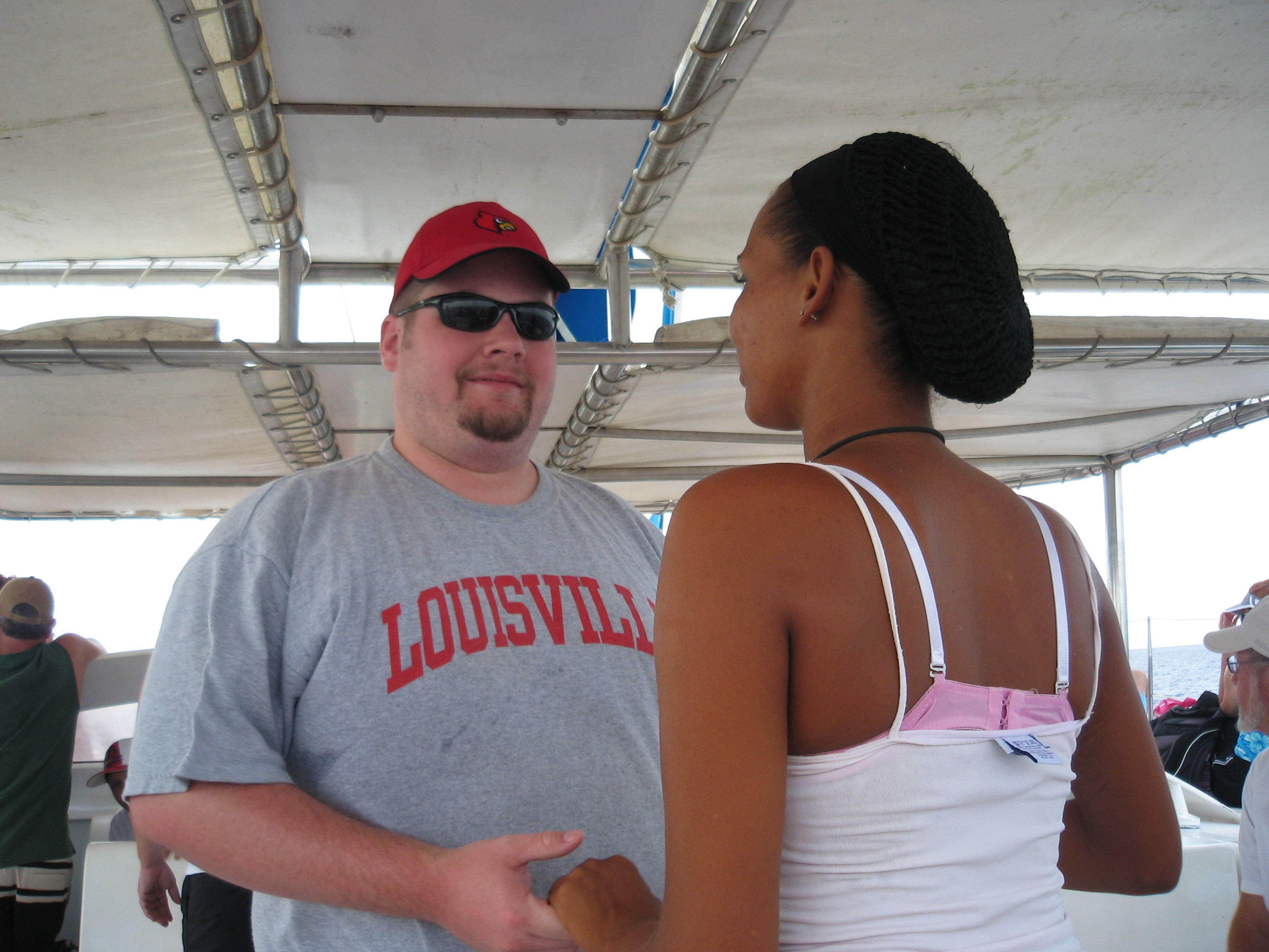 BJ dancing with the tour guide on the Catamaran